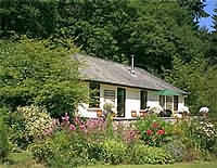 four individual cottages in the three acres of gardens and mixed woodlands